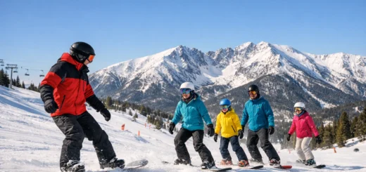 Cours de snowboard à Eyne Cambre d’Aze avec un instructeur et des élèves sur la neige.